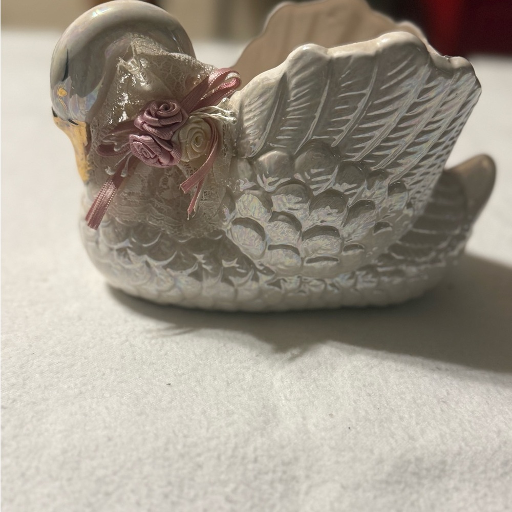 Iridescent Ceramic Swan Figurine with Pink Ribbon Roses
